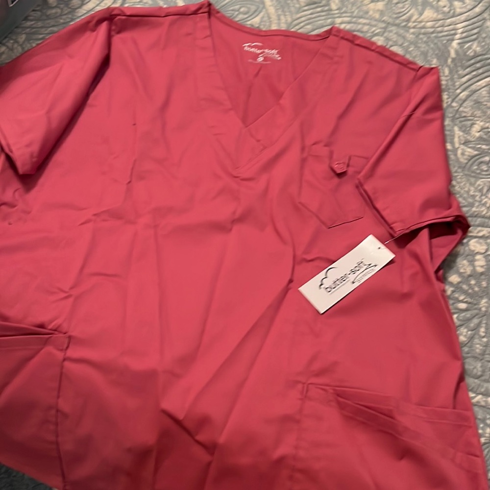 Scrub top. Lots of details. Never worn